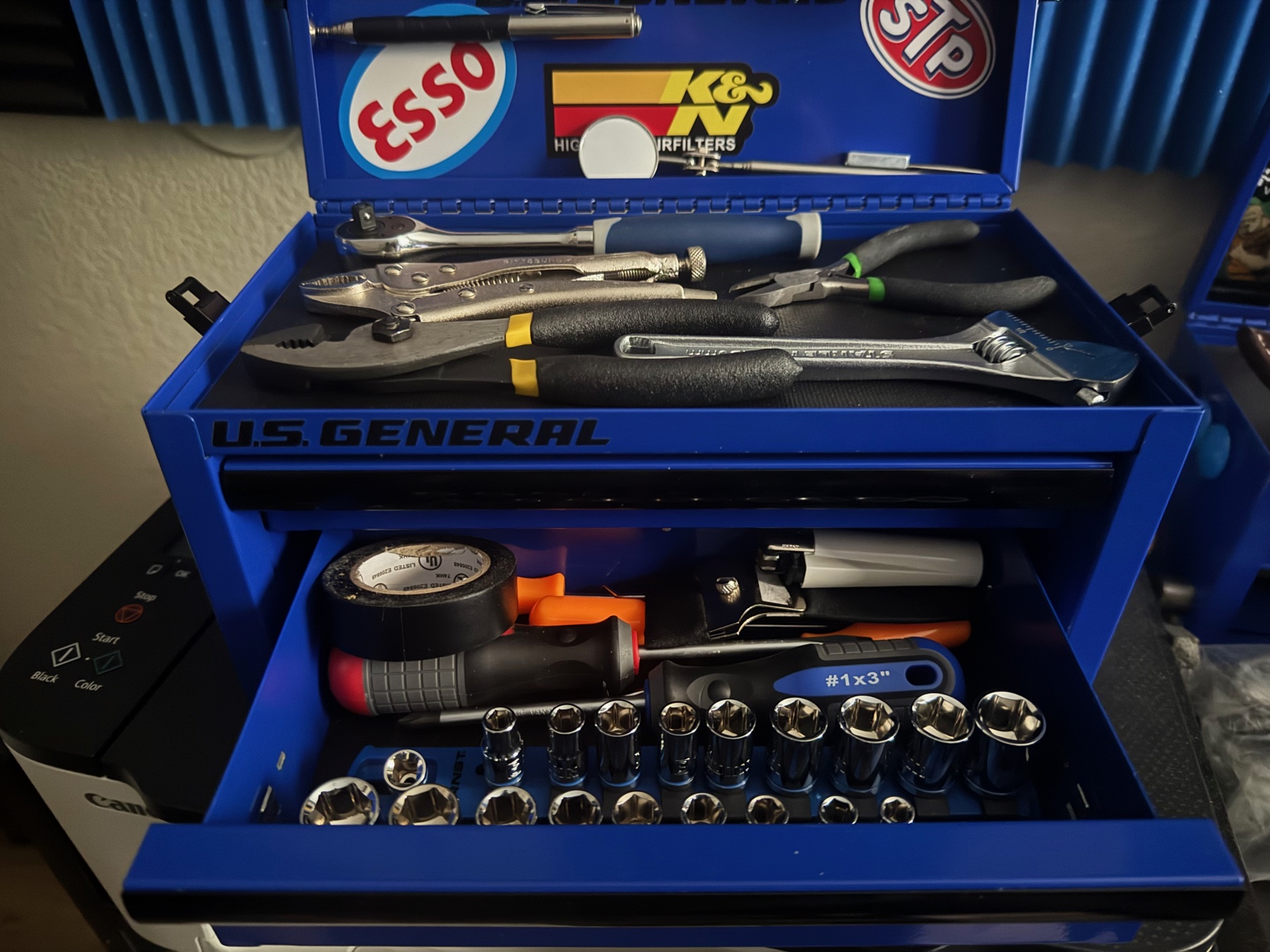View of top layer second drawer showing sockets, screwdrivers, picks and tape.